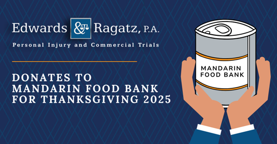 Two people exchange a bag of food in front of a sign that says Mandarin Food Bank